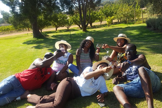 A Visit To Stellenbosch Franschoek Paarl Wineries From Cape Town Full Day - Fairview: wine, cheese, biltong, and Paarl rock