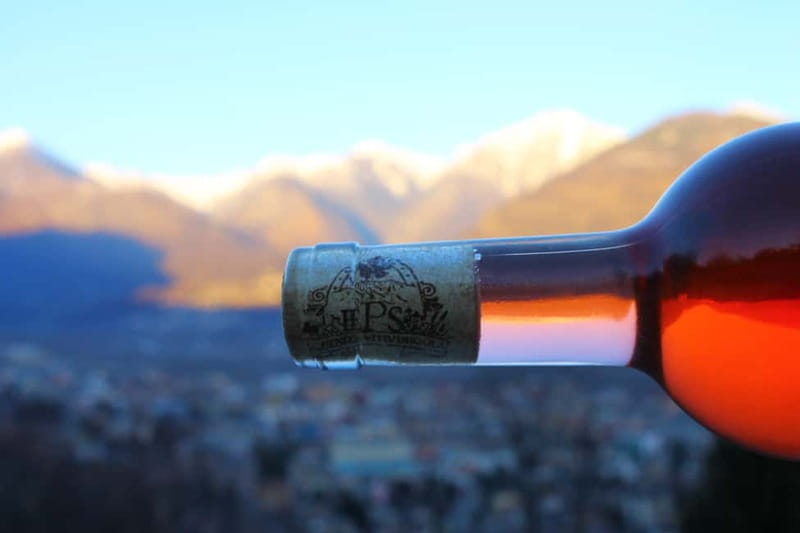 Domodossola: Savor Wines & Local Treats in a Scenic Vineyard - Cheese, salumi, trout, and bread on the table