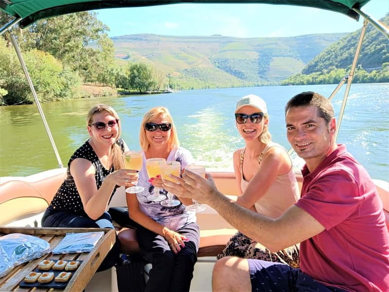 Douro Valley: Winery, Traditional Lunch & Private Boat Trip - First producer: Port, DOC wine, and local character