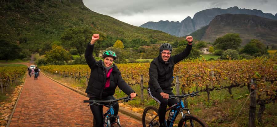 From Cape Town: Franschhoek Vineyards Bike Tour with Lunch - A short lesson at the Huguenot Memorial