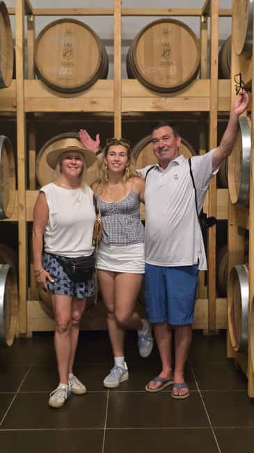 From Durrës: Albanian Wine Tasting with Vineyard & Boat Tour - Albanian wine, raki, and a table of small bites