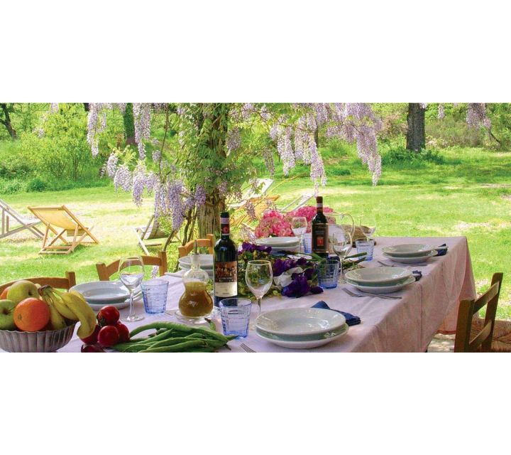 From Florence: Outdoor Wine Dining in San Gimignano Winery - A short walk through the historic winery