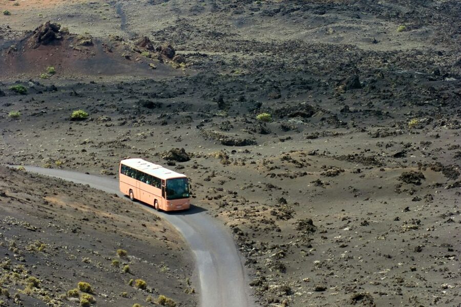 From Fuerteventura: Lanzarote Volcano and Wine Region Tour - Charco de los Clicos and the green lagoon