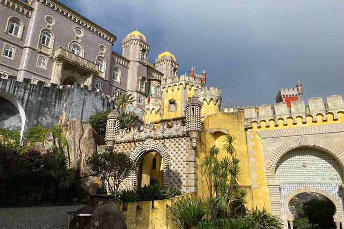 Full Day Tour in Sintra Pena Palace and Quinta de Regaleira - Guincho Beach, wind, and dunes