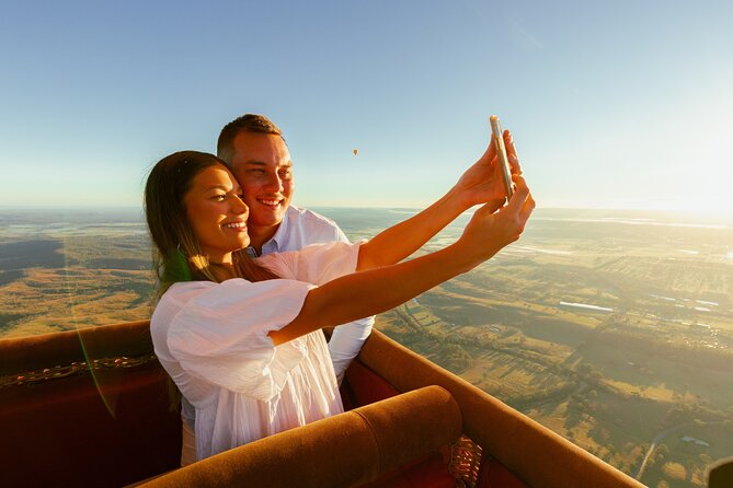 Gold Coast Hot Air Balloon + Winery Breakfast + Return Transfers - Landing, photographs, and packing the balloon