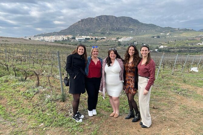 Malaga Organic Vineyard and Winery Six Wines Tapas and Transfer - Walking among vines above the Mediterranean