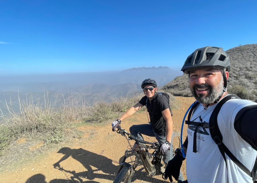 Malibu Wine Country: Electric-Assisted Mountain Bike Tour - Descending toward Malibu vineyards