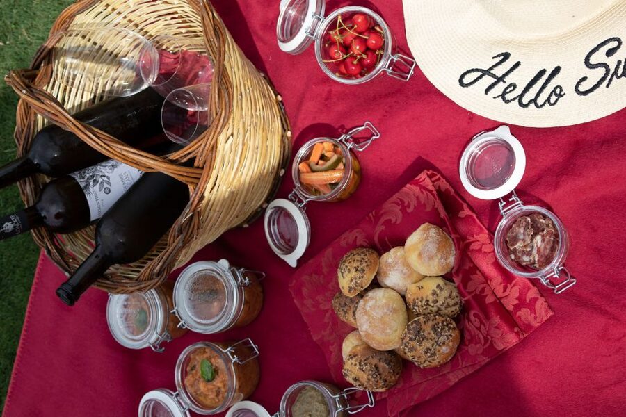 Montalcino: Vineyard Picnic with a Bottle of Wine - The picnic basket and bottle arrangement