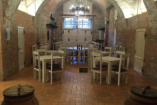 Montepulciano: Wine Tasting & Lunch in a Typical Winery - Entering Montepulciano’s old underground cellar