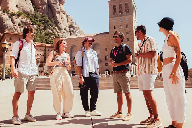 Montserrat Tour with Winery Lunch & Exclusive Cellar Experience - Arriving at Montserrat by cogwheel train