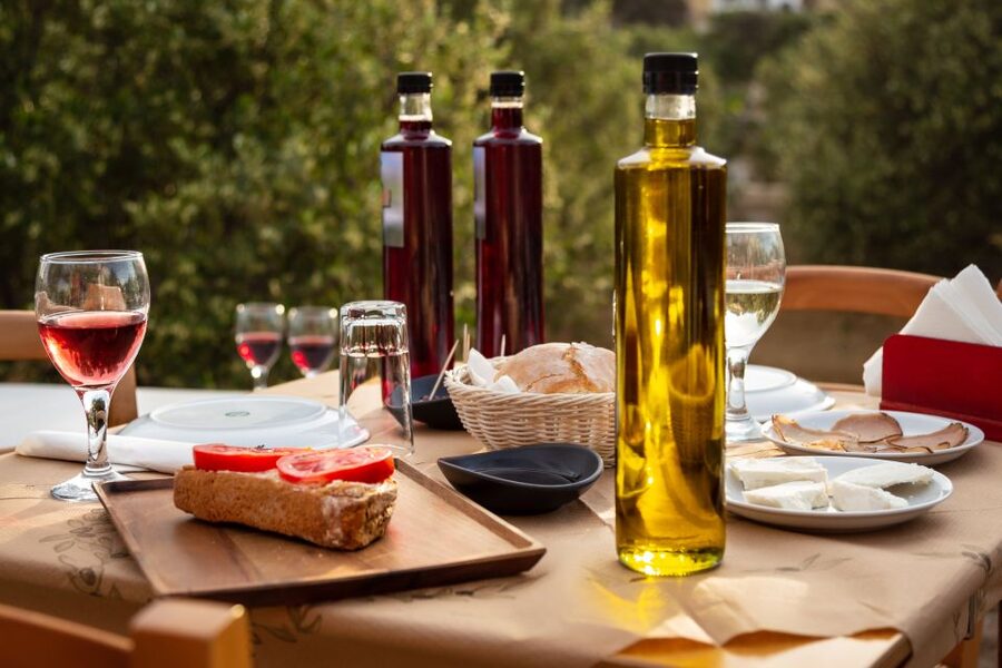 Mykonos: Winery Vineyard Experience with Food & Wine Tasting - Walking through the olive grove and vineyard