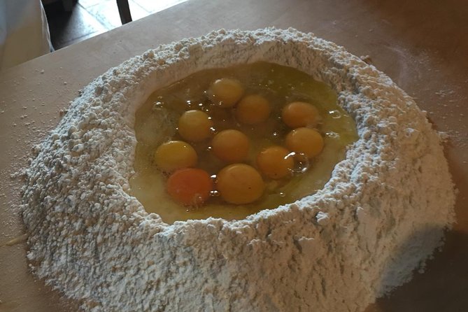 Organic cooking class with a sommelier in an Olive and wine farm - Making frisella, pasta, and sauce by hand