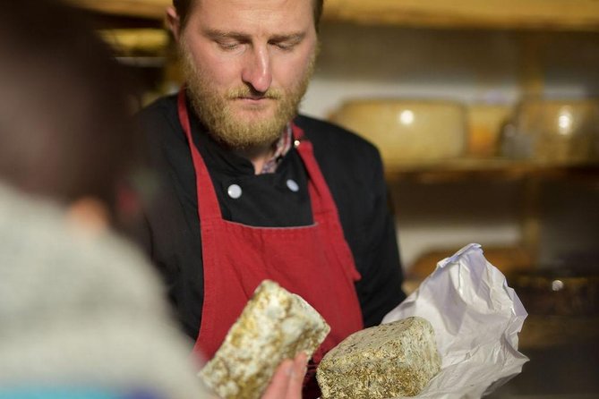 Paris Art of Pairing Cheese and Wine Tasting in a Cheese Cellar - Seven cheeses, cut fresh for the tasting