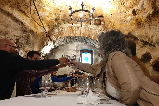Ribera del Duero Underground Cellar & Wine Tasting Experience - Entering the Don Carlos cellar beneath the wine shop