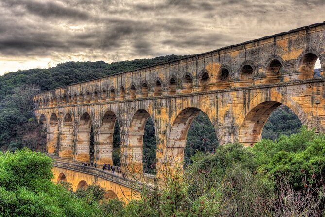 Roman heritages and Chateauneuf du Pape Wine Tour from Avignon - Uzès: medieval Provence in a compact hour