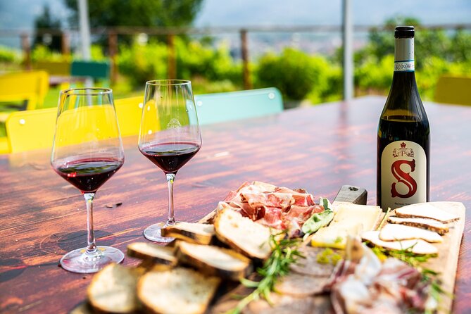 Savor Ossola Wines & Local Treats in a Scenic Vineyard - Local food makes the tasting more satisfying