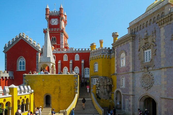 Sintra, Pena Palace, Quinta da Regaleira & Cascais Group Tour - Sintra village, pastries, and a quick first look