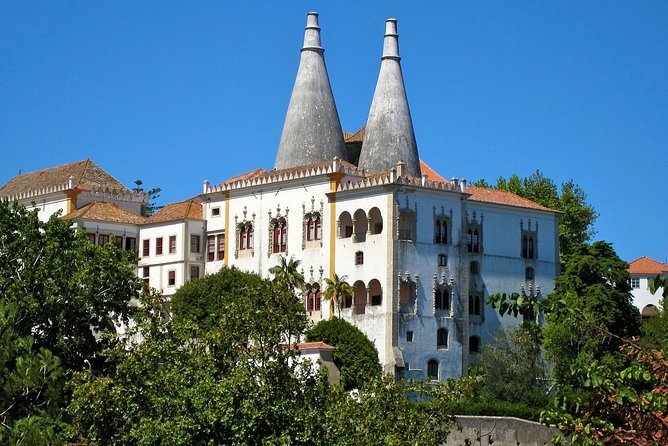 Sintra, Pena Palace, Quinta da Regaleira & Cascais Group Tour - Estoril and the Casino gardens on the way home