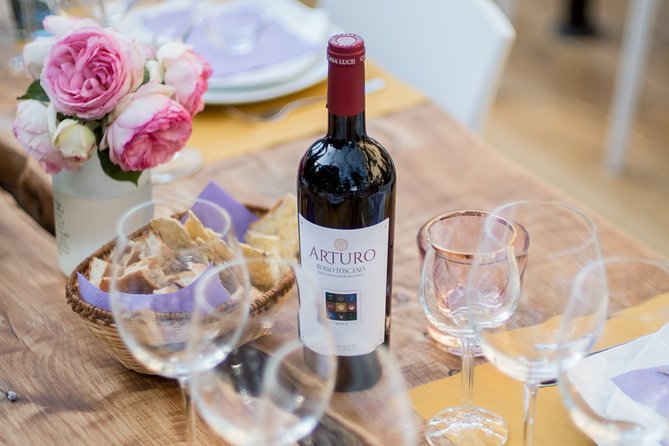 Wine and food tasting in an organic family winery - Walking through the vineyard, garden, and olive grove
